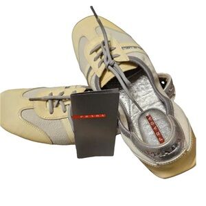 Prada laced up flats in Sz 37. Worn once or twice and are in beautiful condition